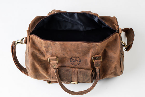 Tan leather duffel bag 