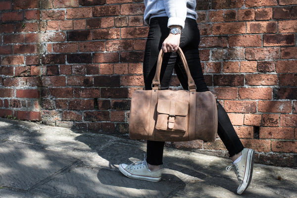 tan leather duffle bag