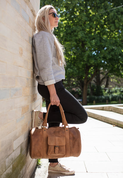 tan leather duffle bag